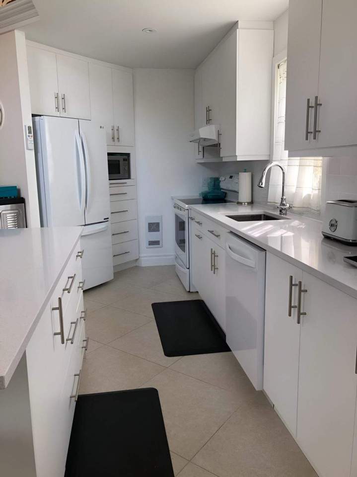 Cuisine bois élégant style chaleureux Saint-Colomban